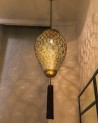 Lustre en cuivre ciselé et ajouré orné d'un pompon | Marrakech deco