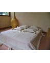 Couvre lit en laine vierge naturelle blanche pompon | Marrakech deco